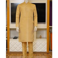 A kurta pajama is an outfit that speaks of culture, tradition and style, so get customize this Uomo Attire's Yellowish Orange Raw Silk Fabric Kurta Pajama for a stylish look at your upcoming event. - Tailored fit design will make you look sharp - Color is absolutely stunning For online prices plz visit: https://uomoattire.com/ or ☎️ Call/WhatsApp on +92300-7668666 / 0300-7618666 Yellow Chanderi Sherwani Straight Kurta, Traditional Cotton Silk Wear With Naqshi For Diwali, Traditional Naqshi Cotton Silk Wear For Diwali, Gold Cotton Silk Traditional Wear With Resham Embroidery, Yellow Long Sleeve Raw Silk Kurta, Gold Cotton Silk Churidar With Straight Kurta, Gold Cotton Silk Churidar With Traditional Drape, Yellow Unstitched Raw Silk Kurta, Gold Cotton Silk Salwar Kameez For Navratri