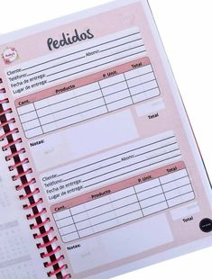 a pink planner with the words pedias written in spanish on top of it