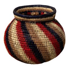 a basket that is made out of woven material and has a blue handle on it