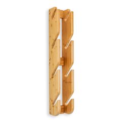 a bamboo rack with three wooden pegs attached to the top and bottom of it