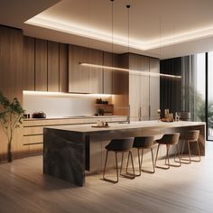 a modern kitchen with wooden cabinets and marble counter tops, along with bar stools