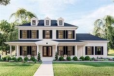 a large white house with black shutters on the front and side windows is shown