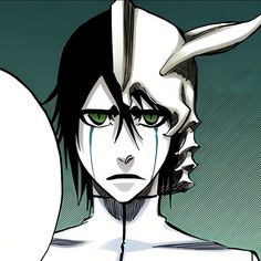 an anime character with green eyes and horns on his head, staring at the camera