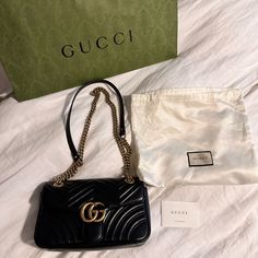 Gg Marmont Medium Shoulder Bag. Like New In Beautiful Condition. Comes With The Gucci Dust Bag And Large Gucci Shopping Bag. Price Is Negotiable, Feel Free To Submit An Offer. Chic Gucci Bag With Removable Pouch, Luxury Gucci Crossbody Shoulder Bag, Gucci Formal Shoulder Bag With Dust Bag, Classic Gift Bags With Gold-tone Hardware, Designer Gucci Bag With Dust Bag Included, Designer Gucci Shoulder Bag For Formal Occasions, Designer Gucci Formal Shoulder Bag, Luxury Shoulder Bag With Branded Hardware As Gift, Gucci Black Bag With Gold-tone Hardware