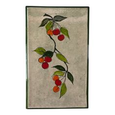 a painting with cherries and leaves on it