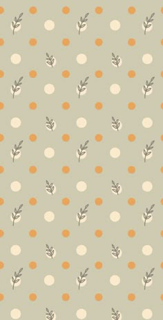 an orange and white polka dot pattern with leaves