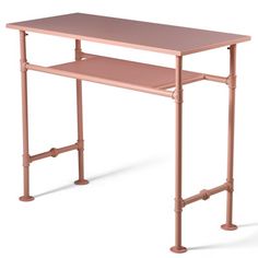 a pink desk with pipes on it