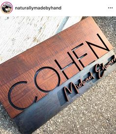 a wooden sign that says cohee made from wood