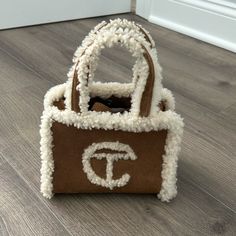 Ugg X Telfar In Chestnut Purse -Small Size Purse -In Good Condition, Has Some Minor Wear And Tear -Can Be Worn With Long Straps Or Tucked In With Smaller Handles -Perfect Winter Bag -Comes With Original Tags And Bag, Can’t Find The Dust Bag Telfar Brown, Telfar X Ugg, Sherpa Bag, Telfar Bags, Ugg Bag, Winter Bag, Winter Bags, Chestnut Color, Mini Handbags