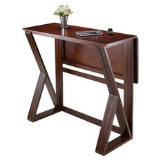 a small wooden desk with a flower vase on it's top and one drawer open