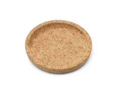 an empty cork plate on a white background