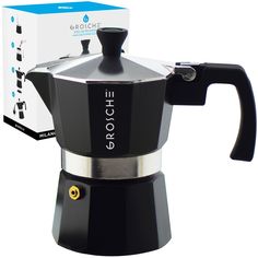 an espresso coffee maker in front of a box