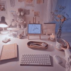 a desktop computer sitting on top of a desk next to a keyboard and mouse pad