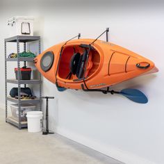 kayak garage storage Surf Rack Wall, Kayak Storage Garage, Sugarberry Cottage, Surfboard Storage, Surf Rack, Overhead Garage Storage, Kayak Storage, Kayak Rack, Boat Storage