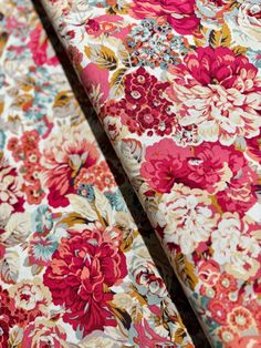 the fabric is very colorful and has many flowers on it