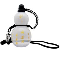 a white and yellow glass snowman ornament with chinese writing on it's side