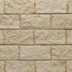 an image of a brick wall that looks like it is made out of cement