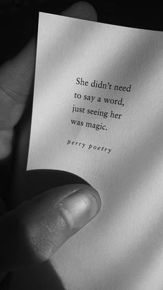 a person holding up a piece of paper with the words she didn't need to say a word, just seeing her was magic