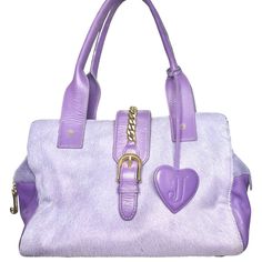 Unleash Your Inner Fashionista With This Rare Find: Vintage Juicy Couture Lavender Purple Pony Hair Fur & Leather Purse! Make A Statement With This Unique Piece That Exudes Luxury And Style. Crafted With Premium Leather And Adorned With Plush Pony Hair Fur, It's A True Collector's Item. Elevate Any Outfit With Its Bold Color And Texture. Don't Miss Your Chance To Own A Piece Of Fashion History! 3 Compartments Gold/Brass Accent Charms Zipper Pulls Rare!! Excellent Condition!! Vintage Juicy Couture, Fur Bag, Luxury Purses, Juicy Couture Bags, Pony Hair, Lavender Purple, Rain And Snow Boots, Fashion History, Leather Purse