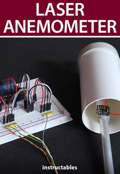 an electronic device with wires attached to it and the words laser anemometerer