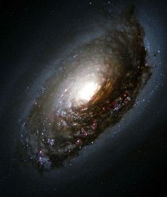 an image of a spiral galaxy in the night sky