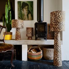 a room filled with lots of animal print furniture