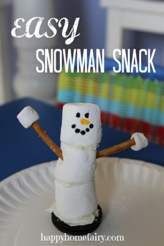 an easy snowman snack made out of marshmallows and cinnamon sticks is on a paper plate