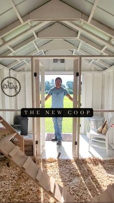 a man standing in the doorway of a house