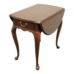 a small wooden table with an open drawer on the top and one drawer at the bottom