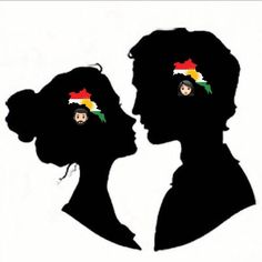 the silhouettes of two people with their faces painted to look like they are kissing