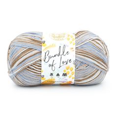 a ball of blue and white yarn with the words bundle of love written on it