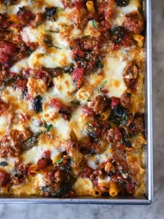 a casserole dish with meat and cheese