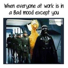 a group of people dressed as darth vader and stormtrooper in star wars with caption that reads, when everyone at work is in a bad mood except you