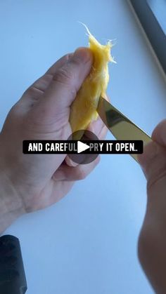 a person is holding a knife and peeling an orange with the words and careful it open