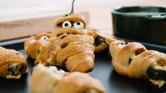 some croissants with googly eyes on them