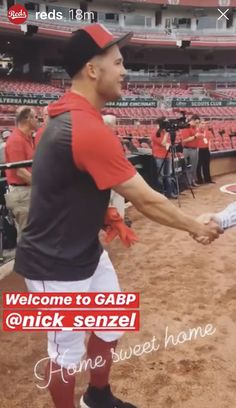 two baseball players shaking hands in front of an empty bleachers with the words welcome to gaap nick sendl home