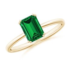 Exuding unmatched beauty, the lab-grown emerald-cut emerald looks absolutely gorgeous on this classic solitaire engagement ring. It is secured in a double-prong setting on a lustrous 18k yellow gold shank. 14k Gold Emerald Cut Emerald Ring For Everyday, Timeless Rectangular Emerald Ring In 14k Gold, Rectangular Emerald Ring With Polished Gold Finish, Heirloom 14k Gold Solitaire Emerald Ring, 14k Yellow Gold Emerald-cut Emerald Ring, Classic Engagement Ring Solitaire, Classic Engagement Ring, Emerald Rings, Classic Engagement