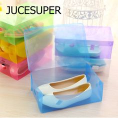 several different colored shoes in plastic boxes on a table with the words jucesuper above them