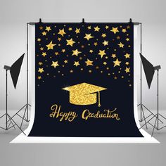 a graduation backdrop with gold stars on it