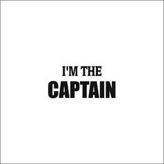 the words i'm the captain are black and white