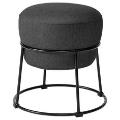 a round stool with metal legs and a grey upholstered cushion on the top