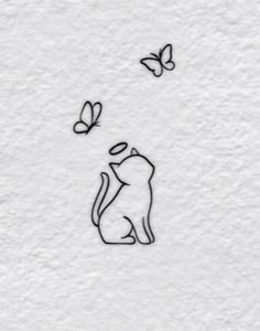 a drawing of a cat with butterflies flying around