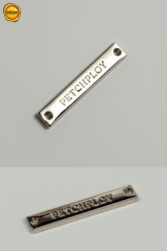 two different types of metal name tags on a gray background and one with the word pitchjoy printed on it