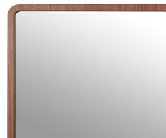 a wooden framed mirror on a white background