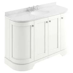 a white bathroom vanity with two sinks on it's sides and no faucet