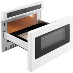 a white microwave oven with its door open and the interior drawer opened to show what's inside