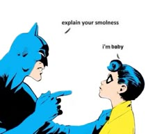 an image of batman and baby pointing at each other with caption explaining explain your smolliness i'm baby