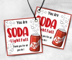 two soda bottle tags with the words soda lightful and you are sooa on them