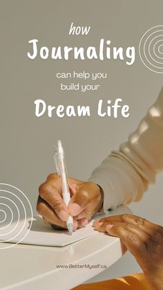 a person writing on a piece of paper with the words how journaling can help you build your dream life