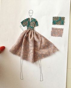 a drawing of a dress made out of paper and fabric with buttons on the back